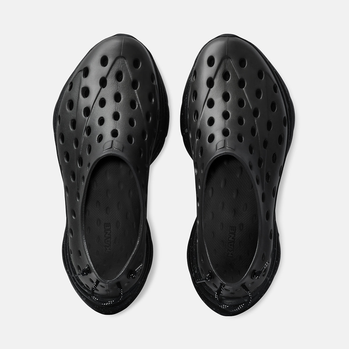 KANE Revive recovery shoe in charcoal / black speckle color, top view