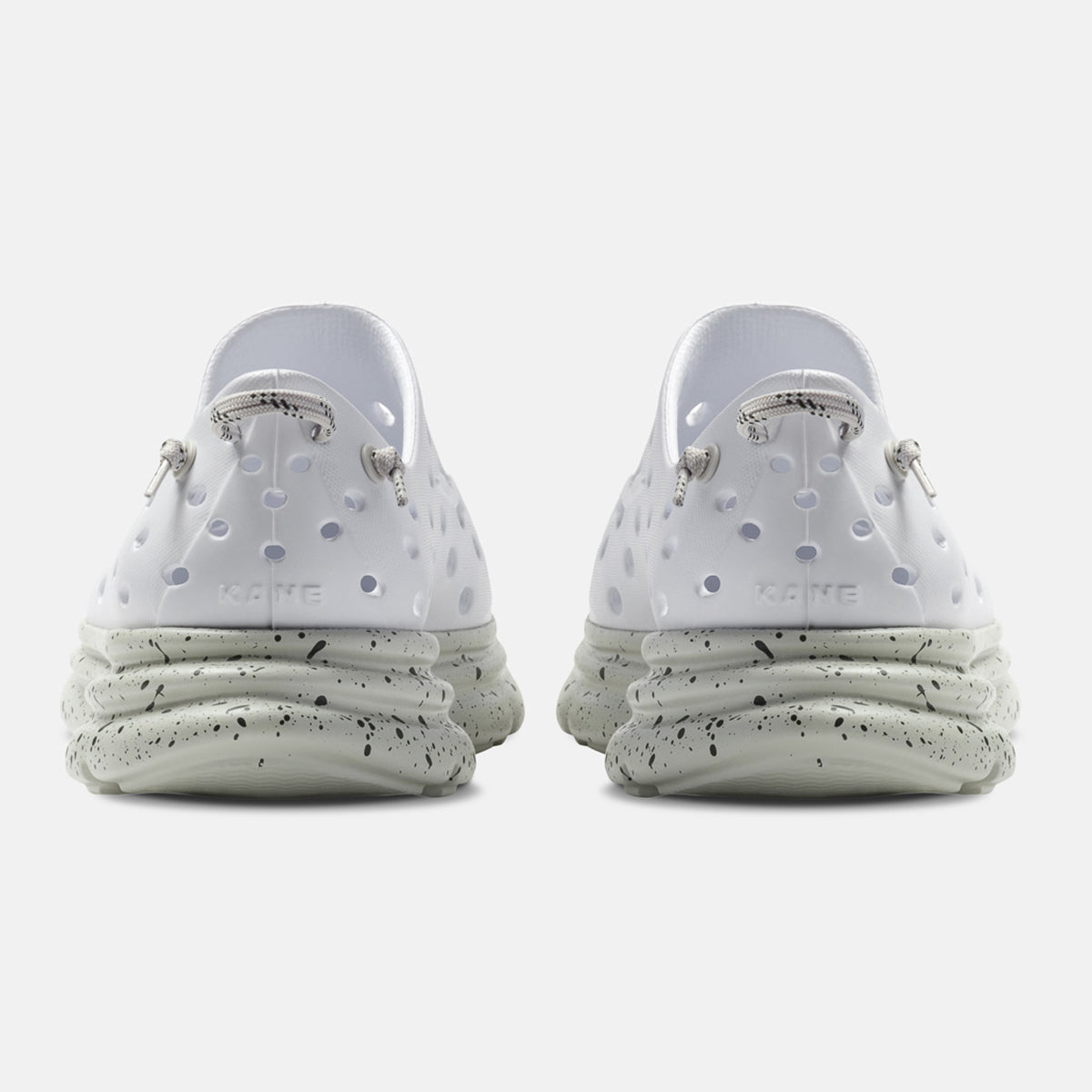 KANE Revive recovery shoe in white / gray speckle color, back view