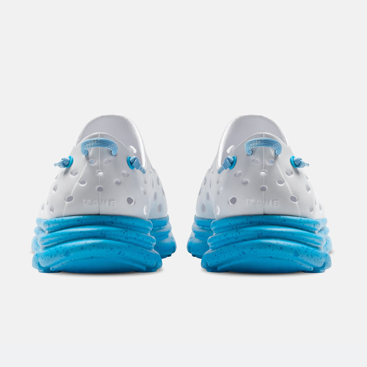 KANE Revive recovery shoe in white / pacific color, back view