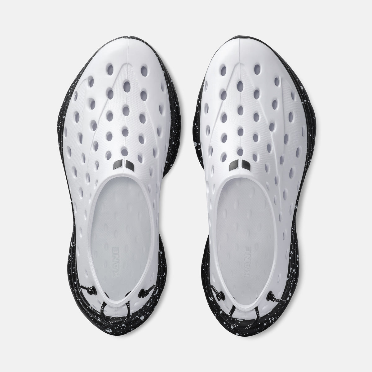 KANE Revive recovery shoe in white / black speckle color, top view