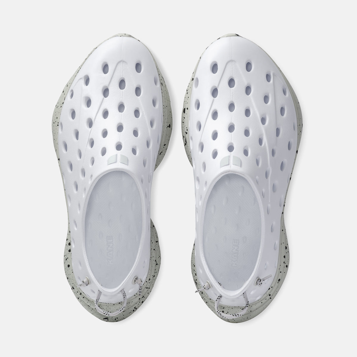 KANE Revive recovery shoe in white / gray speckle color, top view